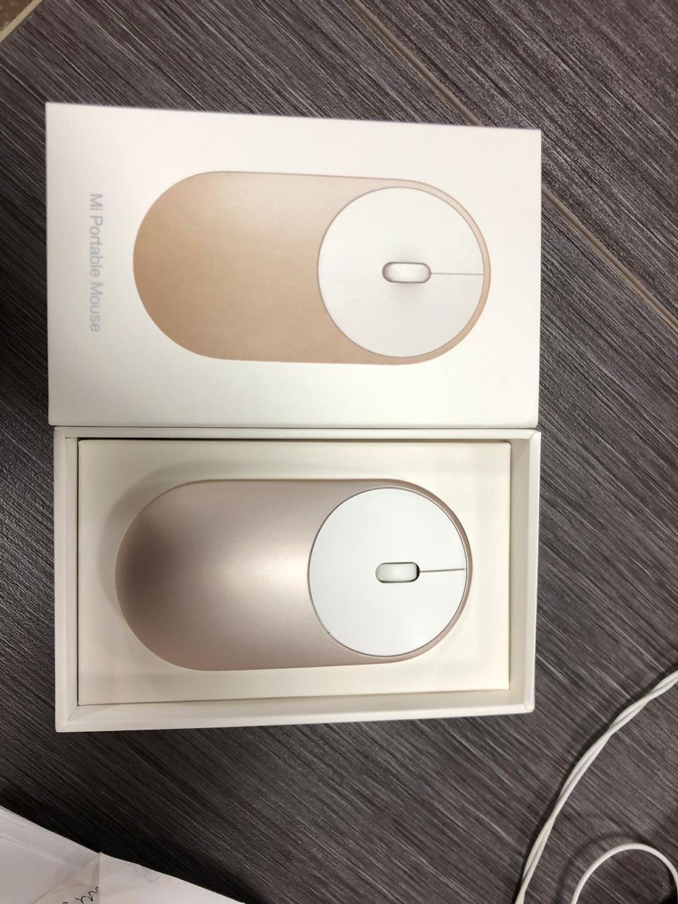 Фото Беспроводная мышь Xiaomi Mi Portable Mouse Gold Фото Беспроводная мышь Xiaomi Mi Portable Mouse Gold