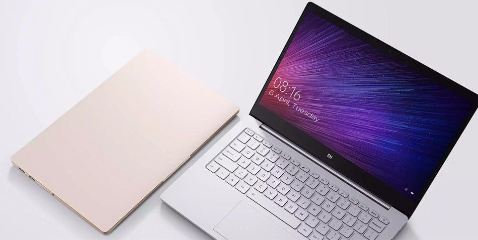 Фото Ноутбук Xiaomi Mi Air 12,5" Core m3 4Gb/128Gb Gold (JYU4048CN) Фото Ноутбук Xiaomi Mi Air 12,5" Core m3 4Gb/128Gb Gold (JYU4048CN)