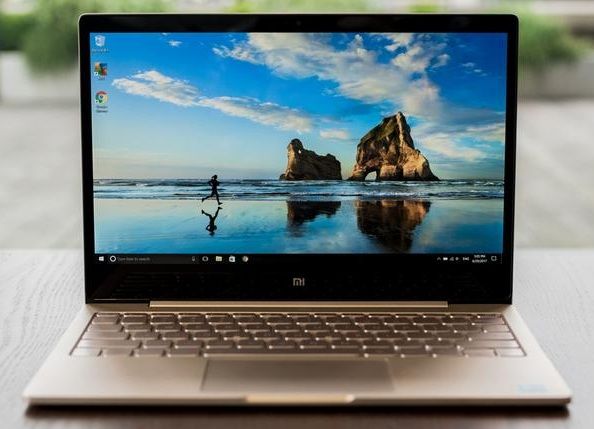 Фотография Ноутбук Xiaomi Mi Air 12,5" Core m3 4Gb/128Gb Gold (JYU4048CN) Фотография Ноутбук Xiaomi Mi Air 12,5" Core m3 4Gb/128Gb Gold (JYU4048CN)